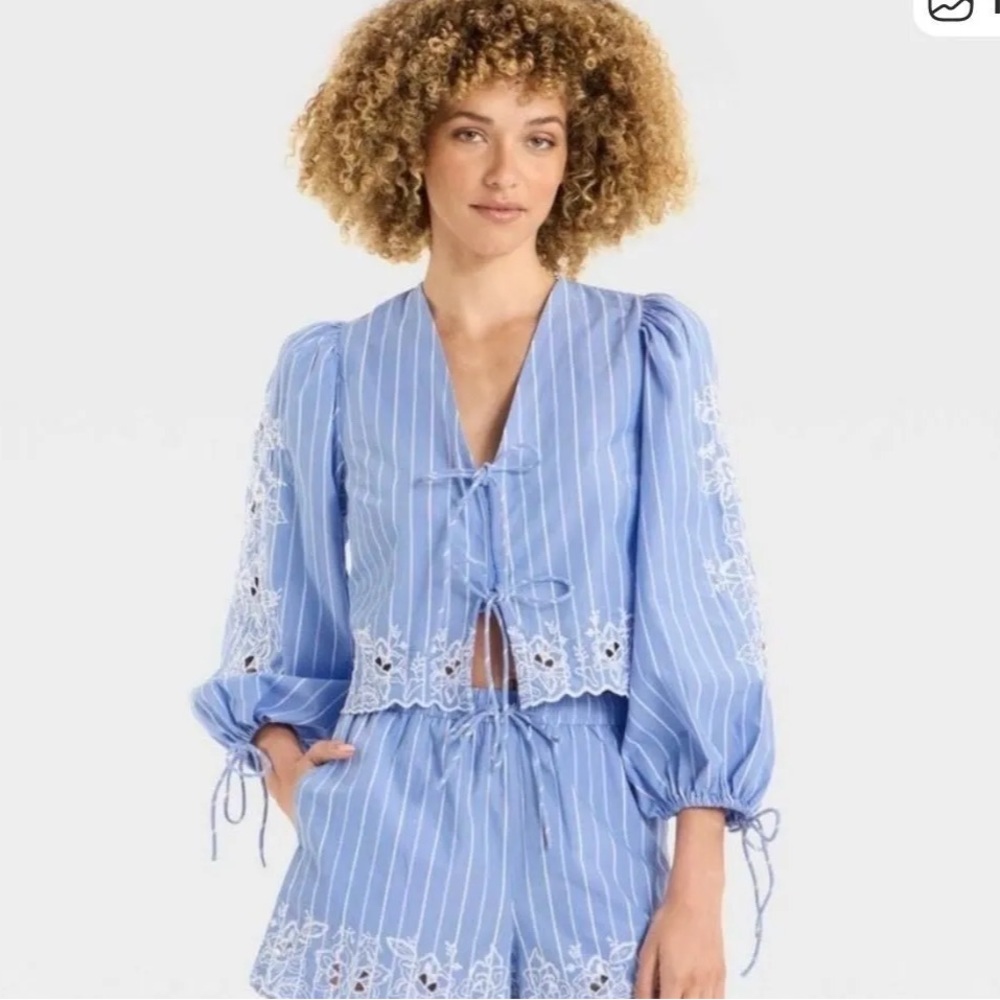 Future collective eyelet tie front top